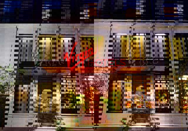 Exterior view of the hotel entrance of Virgin Hotels New Orleans