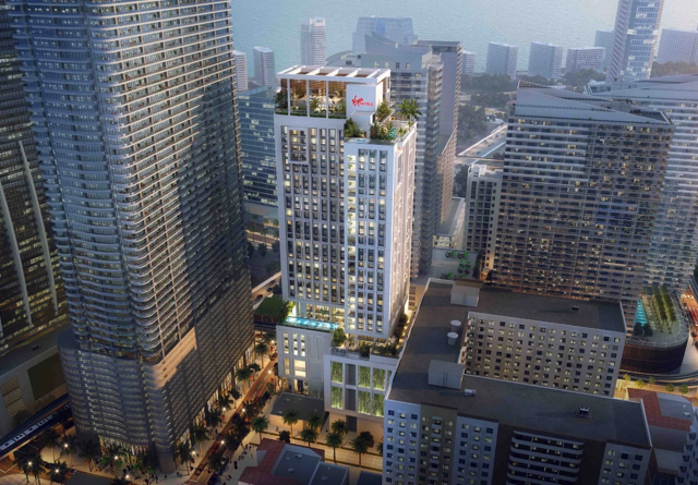 Exterior of Virgin Hotels Miami with vibrant lighting and contemporary design.